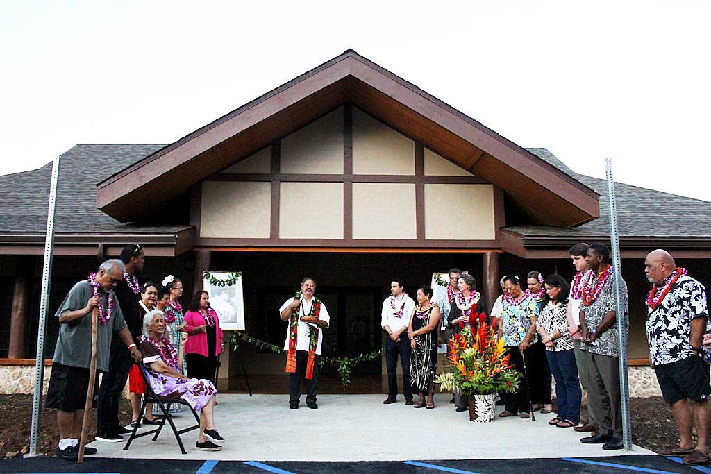 The Waimānalo Hawaiian Homestead Association board, Hawaiʻi legislators, Travois and Pacific Growth Associates gathered at the entrance of the new Waimanālo Community Technology, Education & Employment Center in ceremonies led by Kahu Paul Akau.